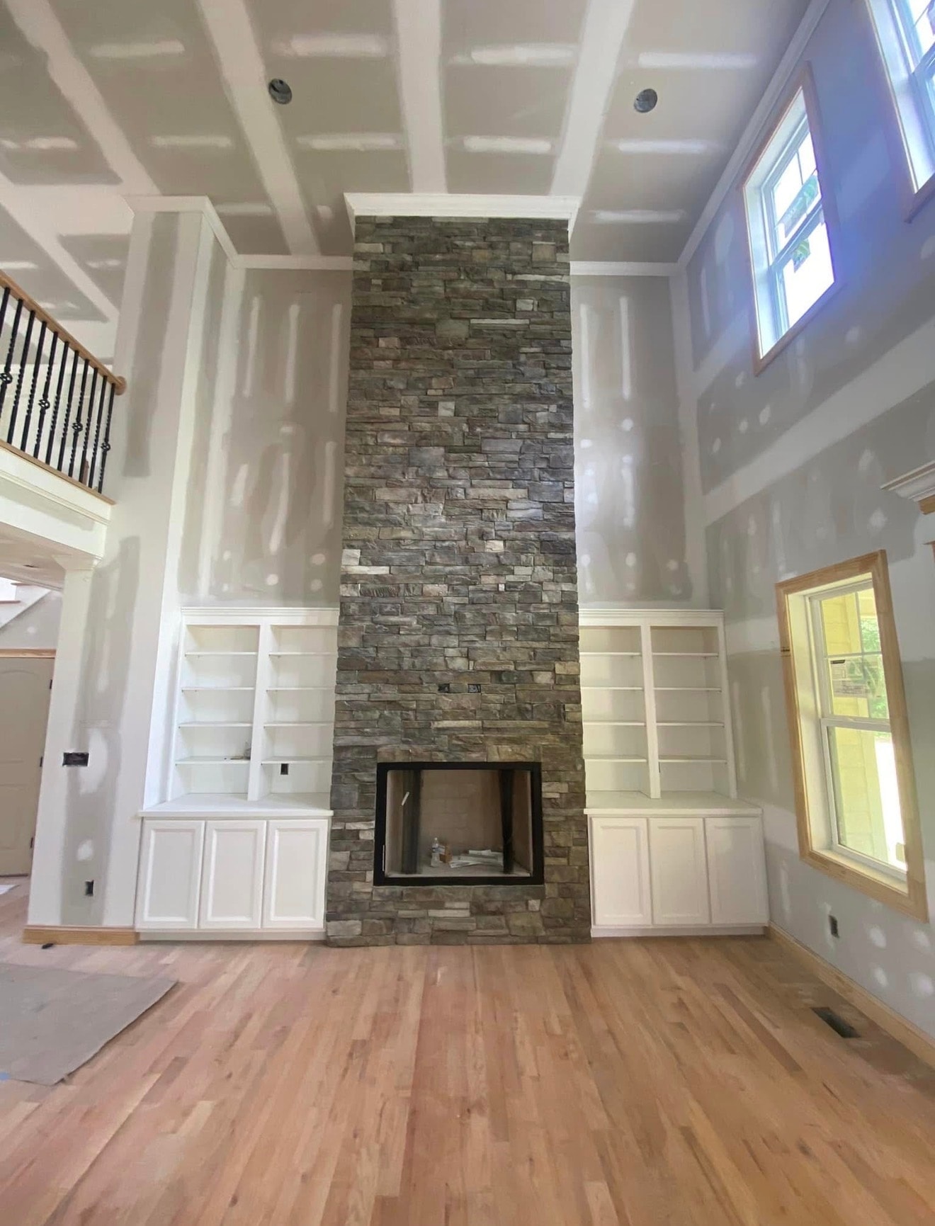 Stone fireplace with built-ins